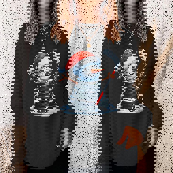 漫画 アイスホッケーパック 雪だるま サンタ帽子付き クリスマス スウェットシャツ 彼女への贈り物