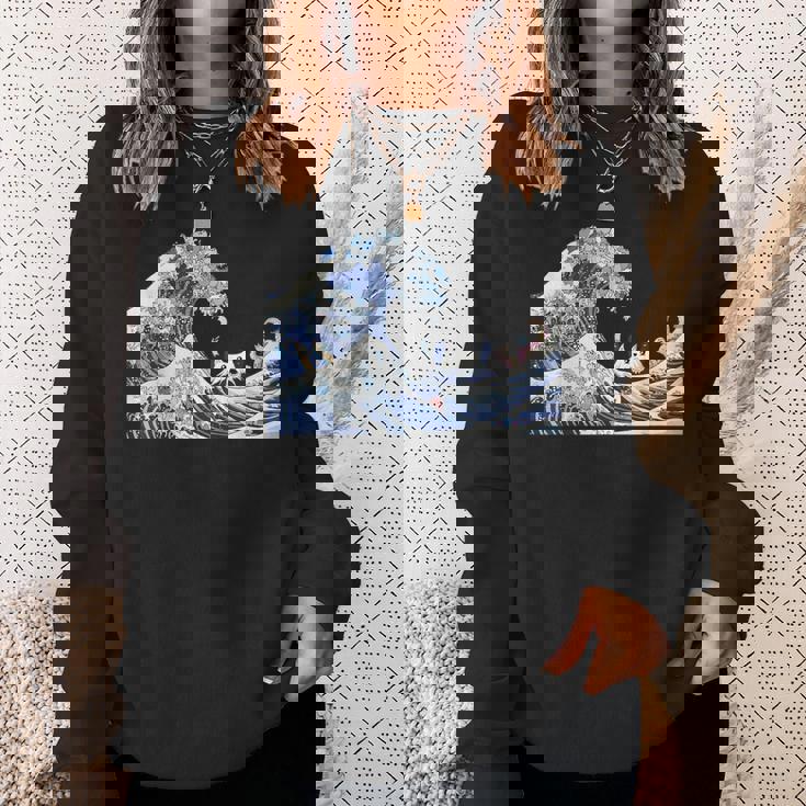 猫がサーフィンをする神奈川の大波 面白い猫の波 かわいい猫、猫好き、かわいい猫 スウェットシャツ 彼女への贈り物