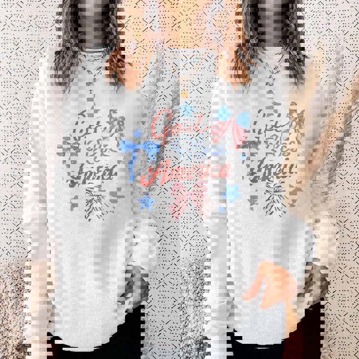 God Bless America コケットボウ 7月4日 キリスト教の愛国心 スウェットシャツ 彼女への贈り物