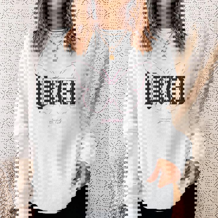 ウィキッド・ムービーロゴグリンダ・アップランド スウェットシャツ 彼女への贈り物