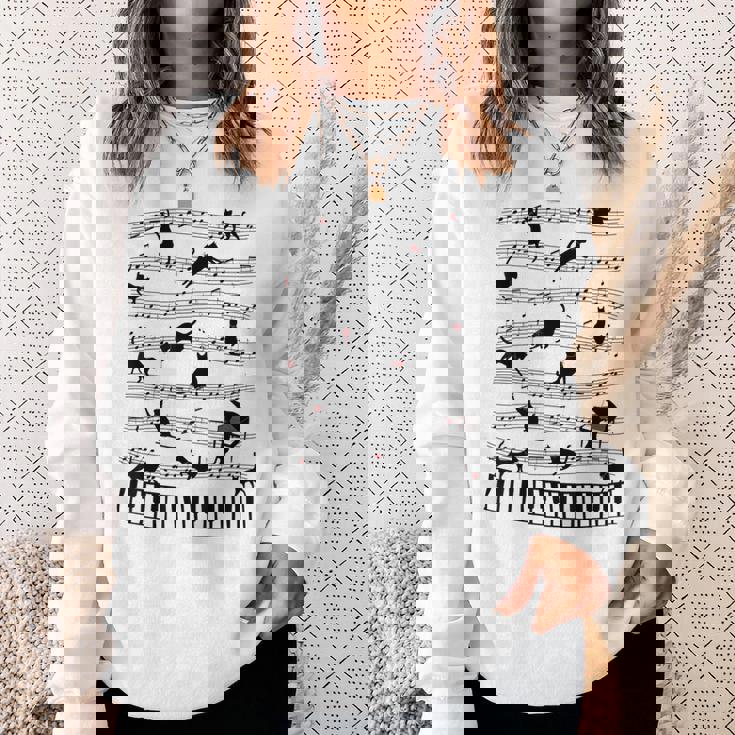 ノーティーキャット 音符付き 音楽 楽譜 おもしろ猫 ギフト スウェットシャツ 彼女への贈り物