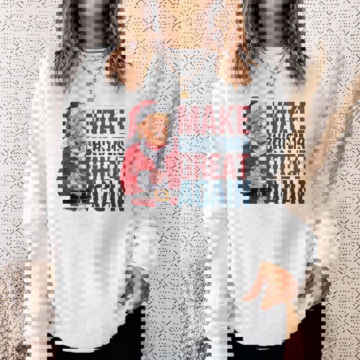 面白いクリスマスグレートアゲイントランプサンタファンusaホリデー 2024 スウェットシャツ 彼女への贈り物