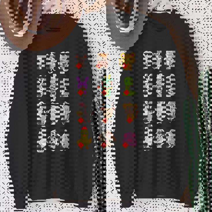 Lindo Conjunto De 12 Animales Chinosigno Del Zodiaco Feliz Año Nuevo Lunar Cuello Camisa de entrenamiento Regalos para ancianas