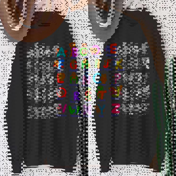 おもしろアルファベット動物新学期abc学習ギフト スウェットシャツ 年配の女性への贈り物