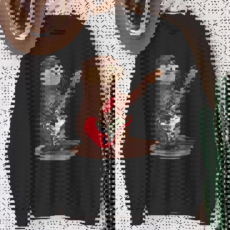 かわいいカワウソがギターを弾くコスチューム。 スウェットシャツ 年配の女性への贈り物