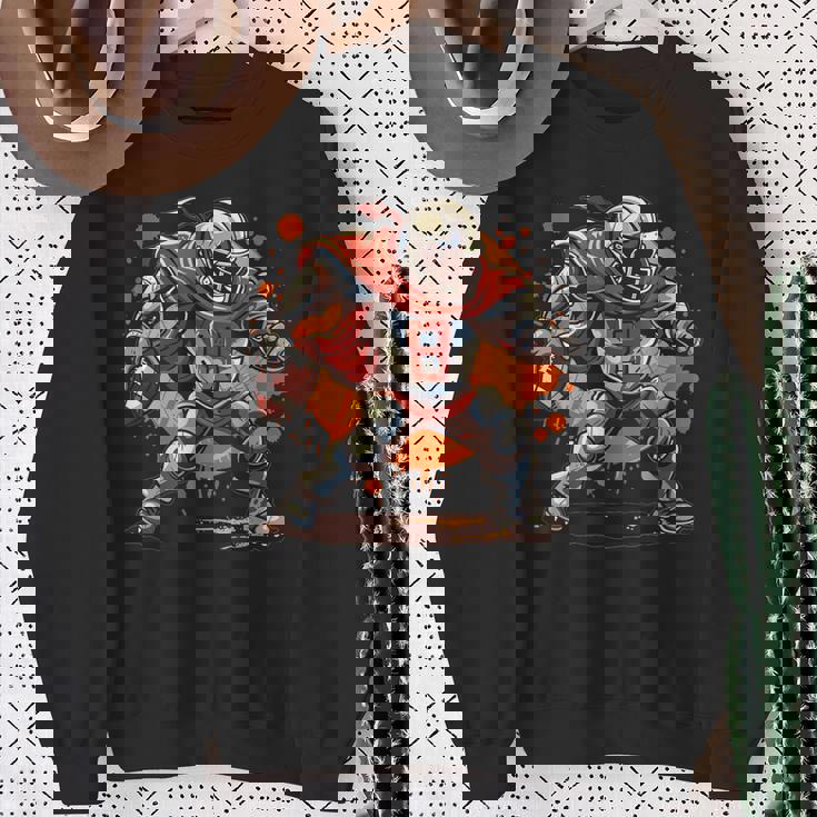 アメリカンフットボールのコスチュームを着たストロングナイト。 スウェットシャツ 年配の女性への贈り物