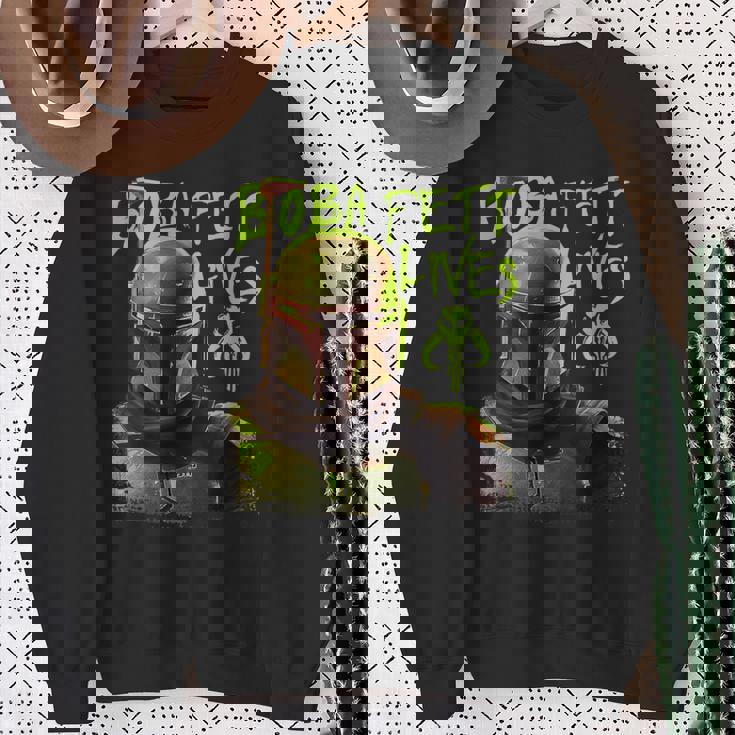 スター・ウォーズ ボバ・フェットの本 ネオン・ボバ・フェット・ライヴズ ポスター スウェットシャツ 年配の女性への贈り物