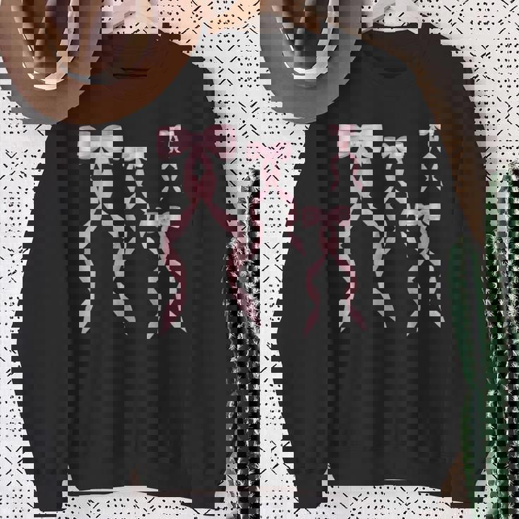 ファンシーピンクのリボンデザイン。 スウェットシャツ 年配の女性への贈り物