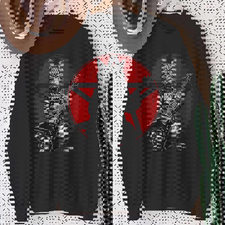 ヘヴィメタル猫とデスメタルミュージック メタルヘッド ロックギター スウェットシャツ 年配の女性への贈り物