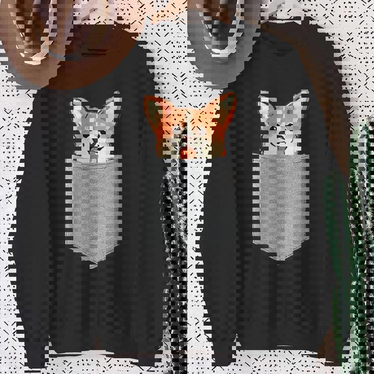 ポケットから覗く可愛いコーギーのデザイン スウェットシャツ 年配の女性への贈り物