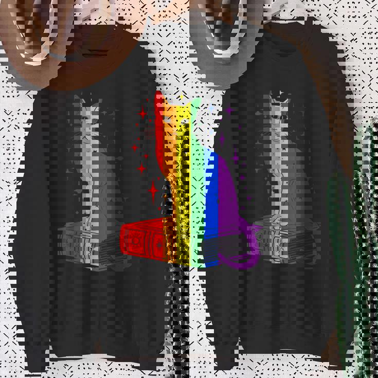 レインボー猫と本と星 Lgbt プライド スウェットシャツ 年配の女性への贈り物
