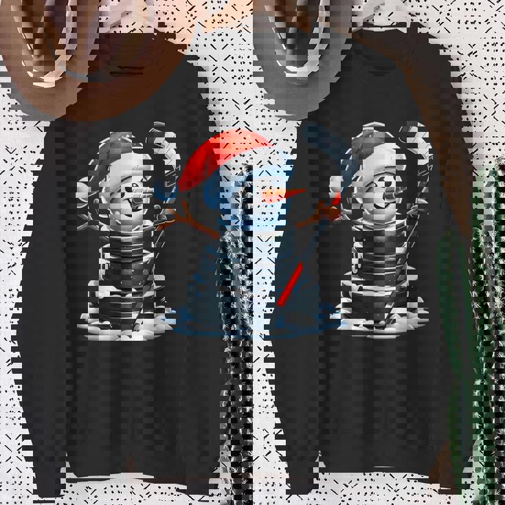 漫画 アイスホッケーパック 雪だるま サンタ帽子付き クリスマス スウェットシャツ 年配の女性への贈り物