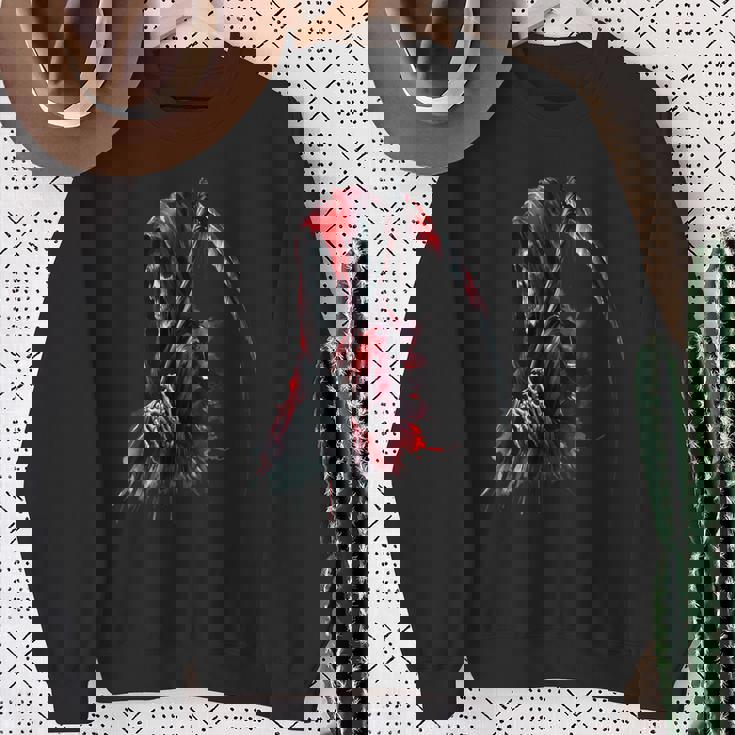 黒と赤のデザインの死神。 スウェットシャツ 年配の女性への贈り物