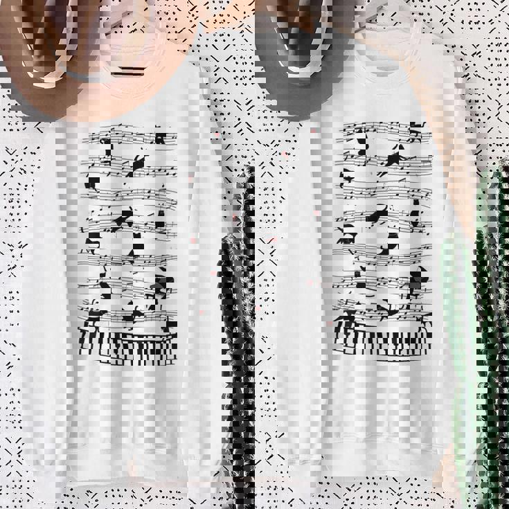 ノーティーキャット 音符付き 音楽 楽譜 おもしろ猫 ギフト スウェットシャツ 年配の女性への贈り物