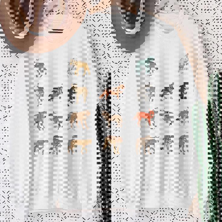 世界のオオカミ 長袖tシャツ スウェットシャツ 年配の女性への贈り物