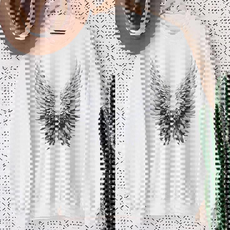 背中には白い天使の羽 スウェットシャツ 年配の女性への贈り物