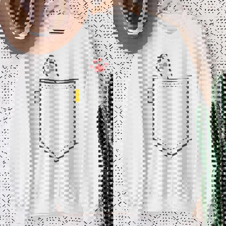 隠れネコ ねこ 猫 隠す 猫好き 猫の足 猫足 肉球 白猫 ワンポイント ポケット デザイン かわいい おもしろ スウェットシャツ 年配の女性への贈り物