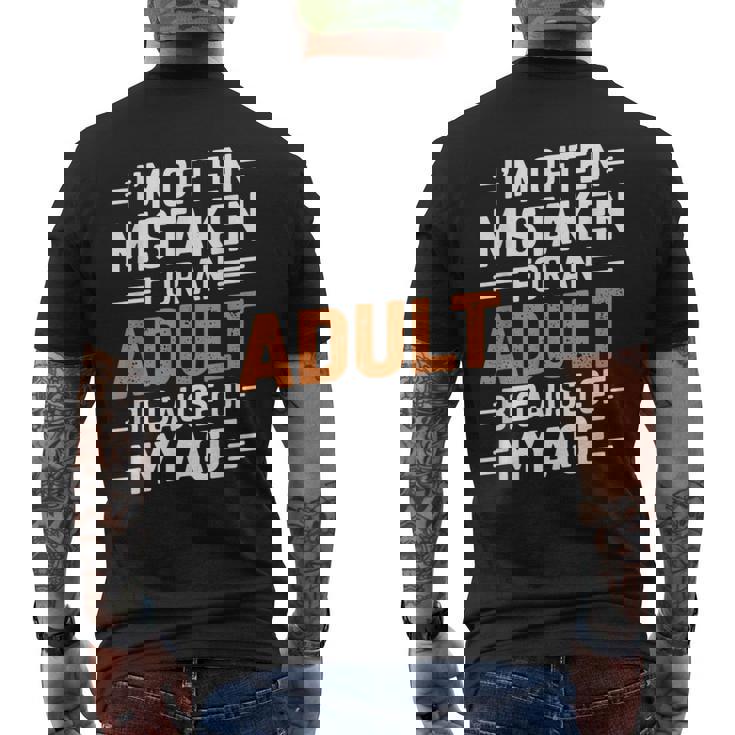 年齢のせいでよく大人と間違われる メンズTシャツ バックプリント