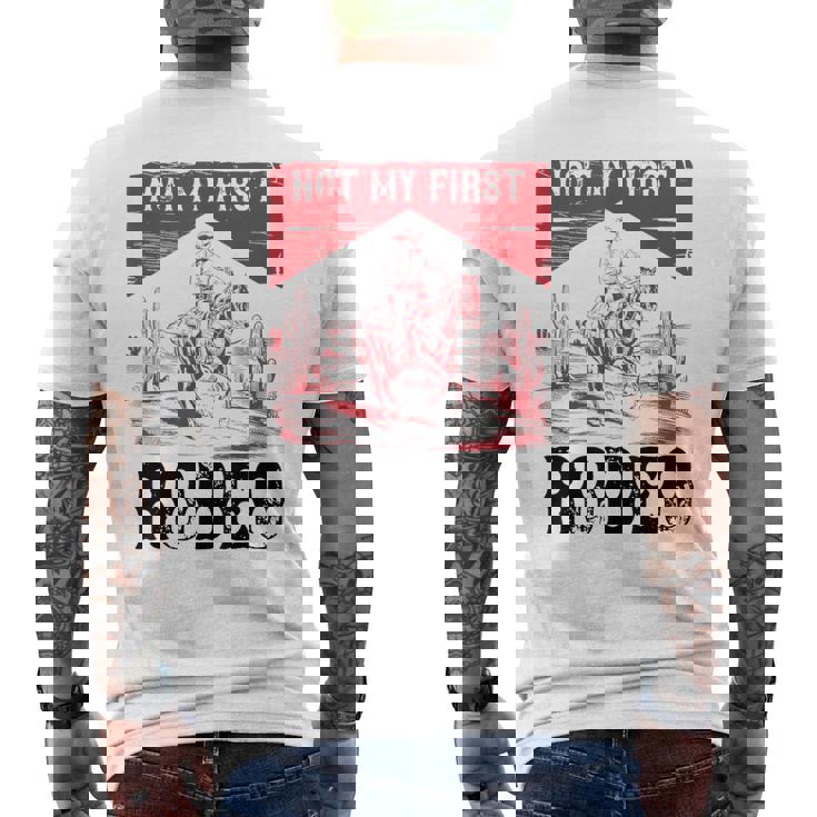 ヴィンテージ・ノット・マイ・ファースト・ロデオ、ファニー・ライディング・カウボーイ・ロデオ メンズTシャツ バックプリント