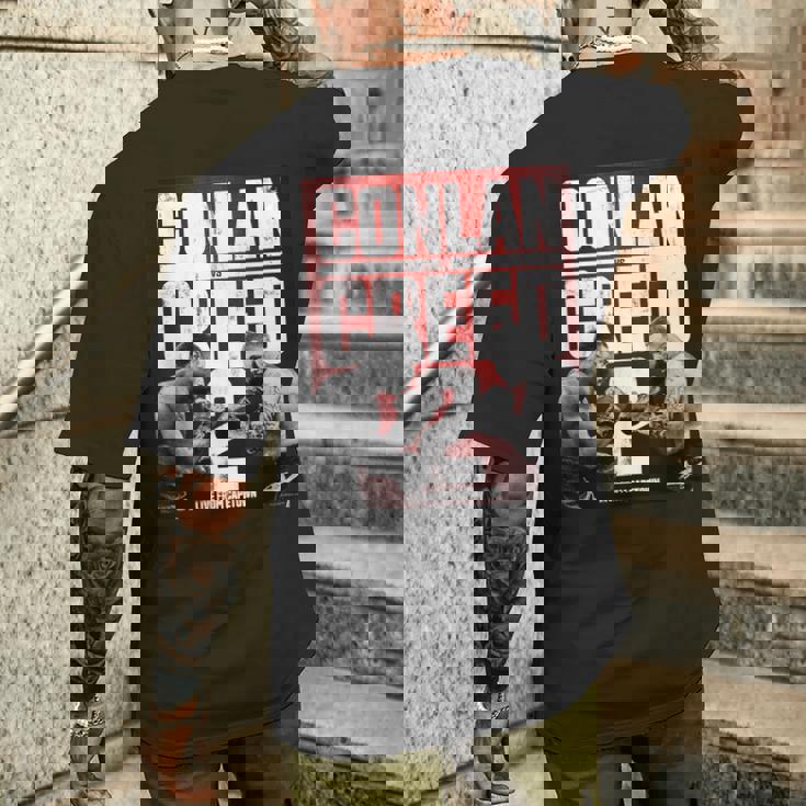 アドニスクリード—ケープタウンからのコンラン対クリード2ライブ メンズTシャツ バックプリント 彼への贈り物