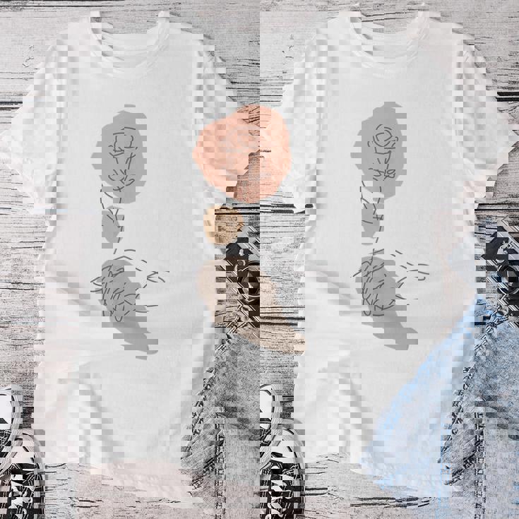 抽象的でミニマリストなラインアート、花柄。 レディースTシャツ 面白い贈り物