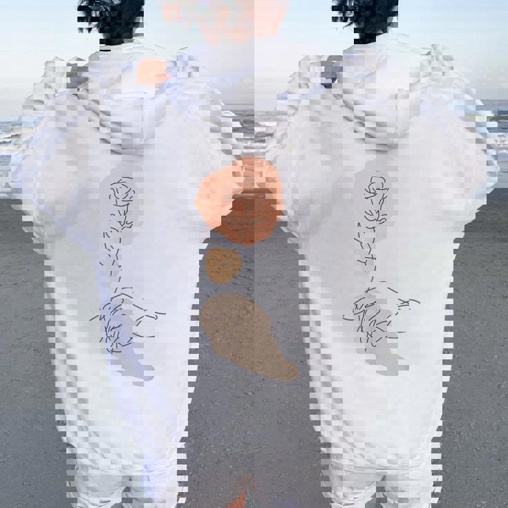 抽象的でミニマリストなラインアート、花柄。 レディース オーバーサイズ パーカー バックプリント