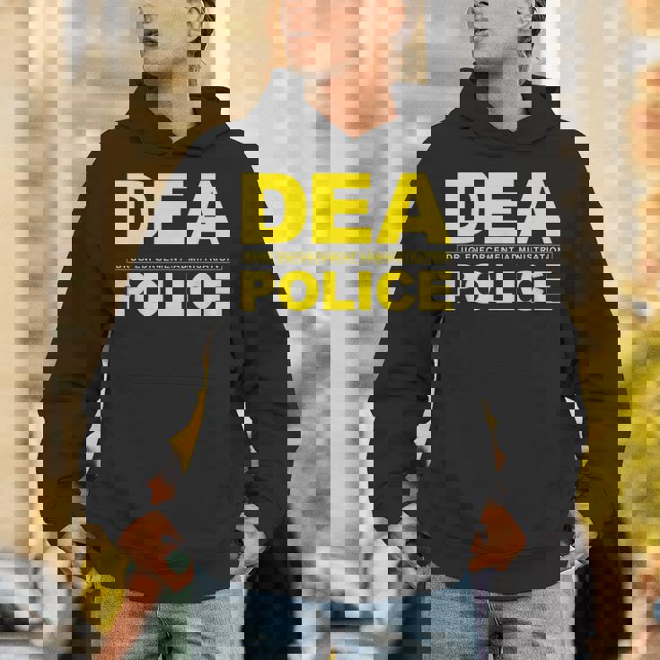 Dea 薬局 警察官 パーカー