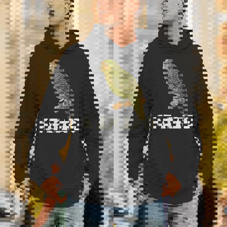 かわいいカカポの鳥が木に座っている パーカー