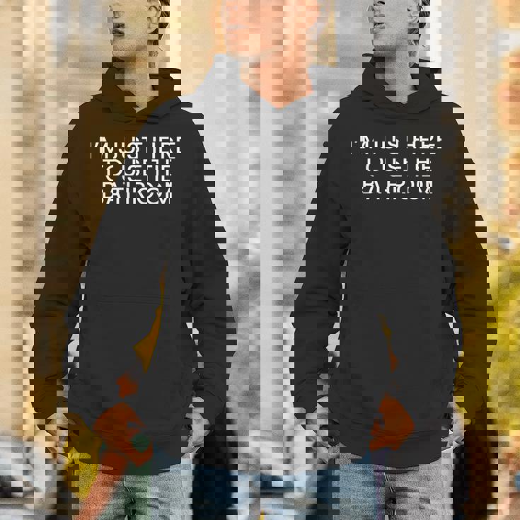 トイレを使いに来ただけだ 長袖tシャツ パーカー