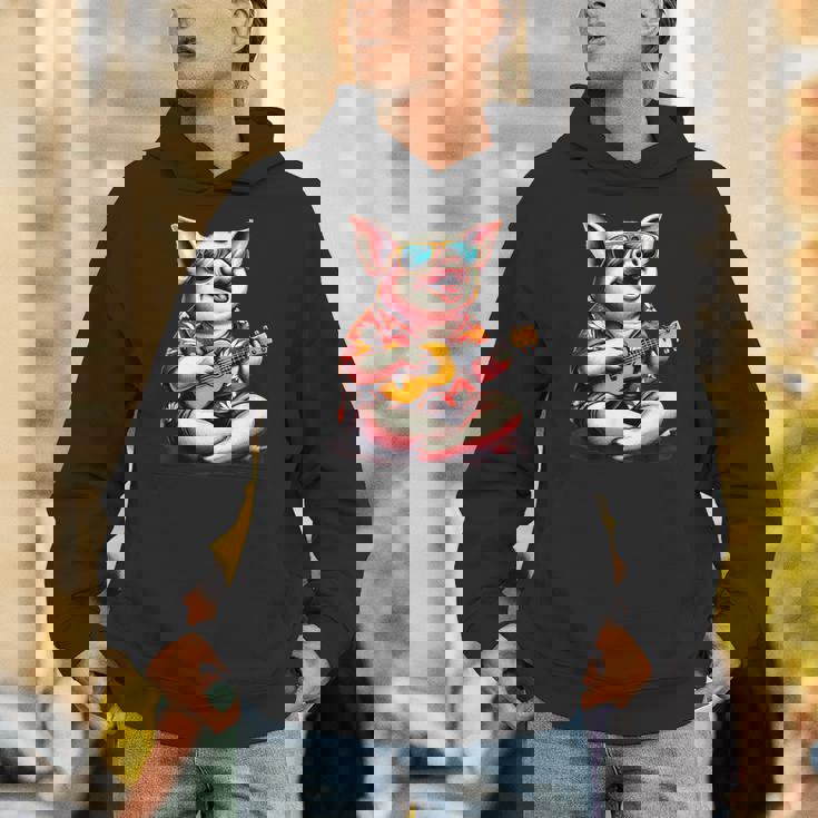 ハワイアンシャツを着たブタ、ウクレレ遊び。 Hoodie