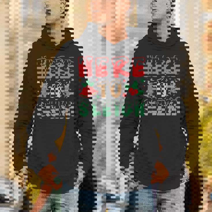 ヒア・トゥ・スレイ・ジョリー・クリスマス・バイブス パーカー