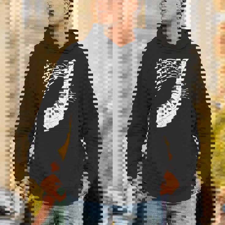 ピアノの鍵盤・音符・楽器ピアノ パーカー