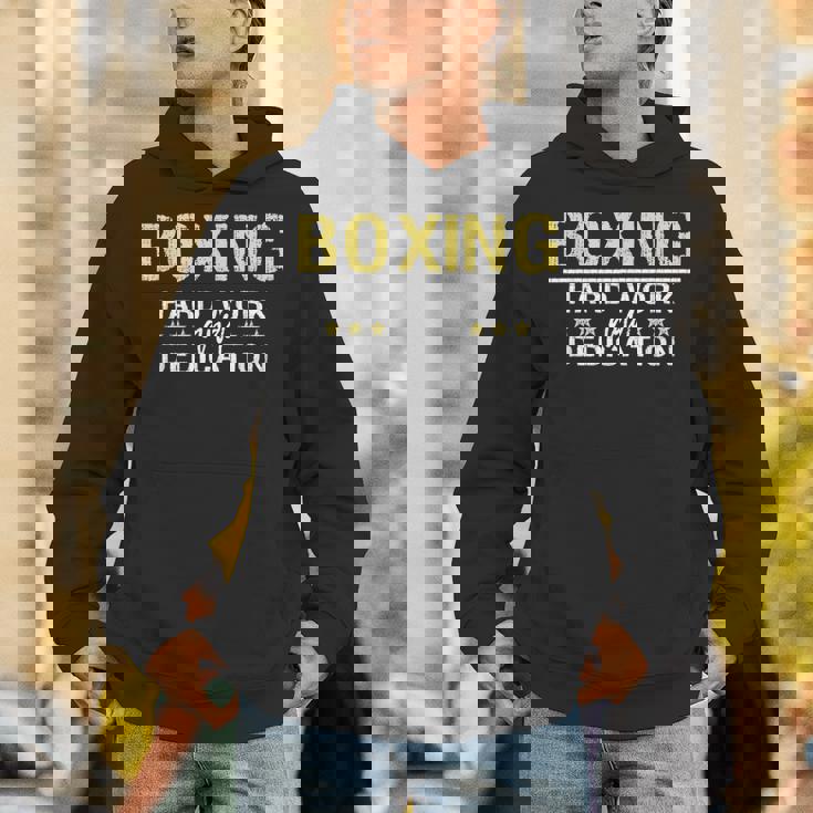 ボクシングハードワークと献身 キックボクシングジムボクサー パーカー