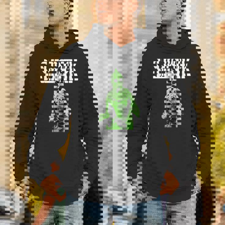 レトロなスリースタック爬虫類エイリアンのグラフィック。 パーカー