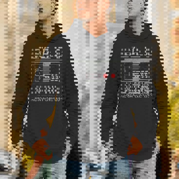 レベル 10 アンロック 10歳の誕生日 10歳のビデオゲーマー 男の子 パーカー