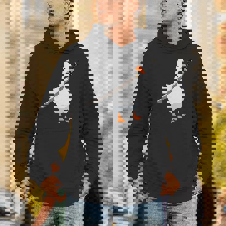 刀を持ったアヒルと剣を持つアヒル 刀包丁 ガチョウ パーカー