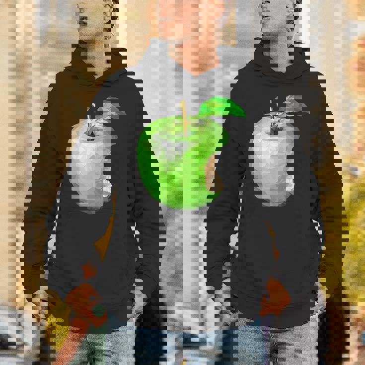 噛まれた青リンゴのイラスト パーカー