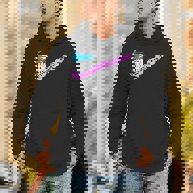 歯磨き粉付きピンク歯ブラシ パーカー