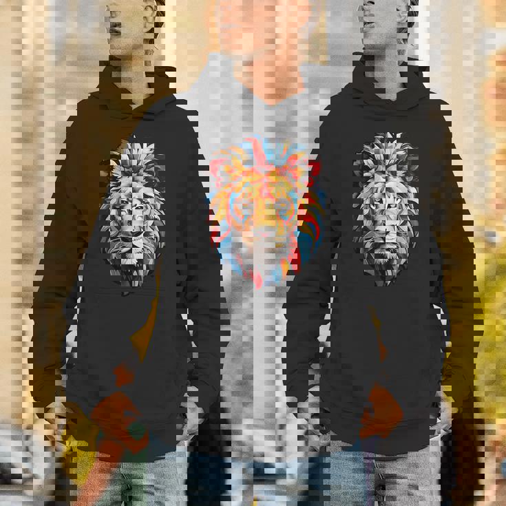 雄大なライオンヘッド 赤、黄、青の芸術的なたてがみ パーカー