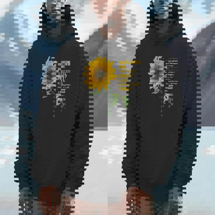 ひまわりガール タトゥー かわいい目 太腿 パーカー