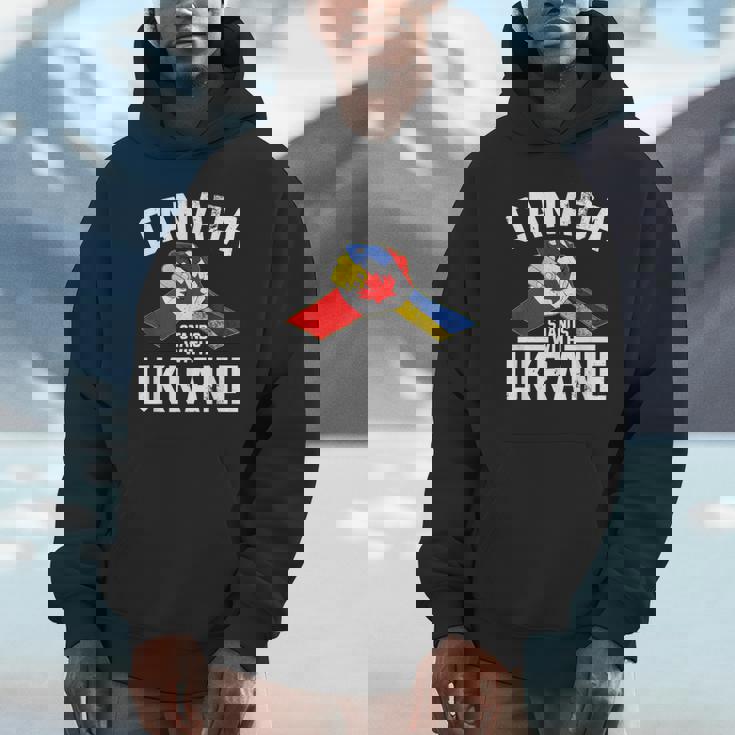 カナダはウクライナのウクライナのカナダの旗のtシャツで立ちます パーカー