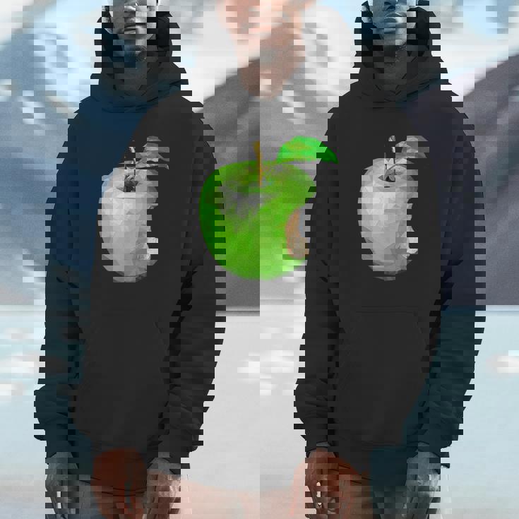 噛まれた青リンゴのイラスト パーカー