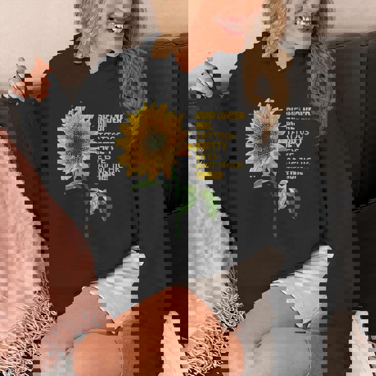 ひまわりガール タトゥー かわいい目 太腿 パーカー