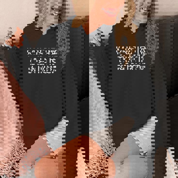 トイレを使いに来ただけだ 長袖tシャツ パーカー