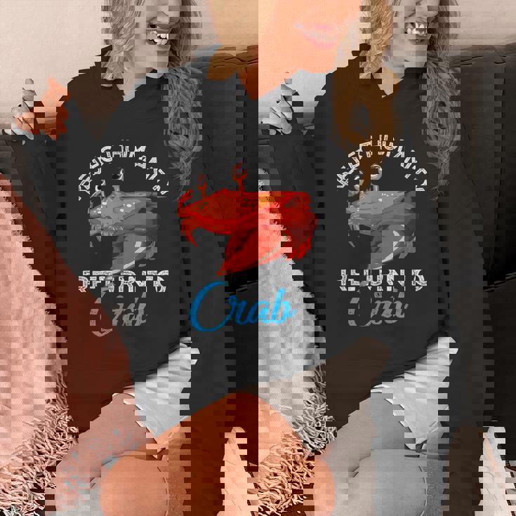 人類を拒絶するカニに戻る進化カニを抱きしめろ パーカー