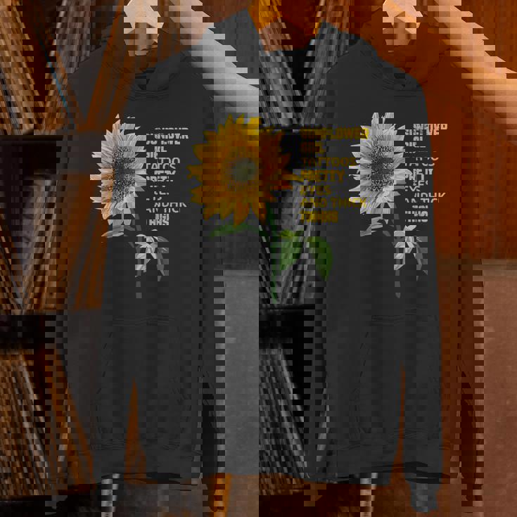 ひまわりガール タトゥー かわいい目 太腿 パーカー