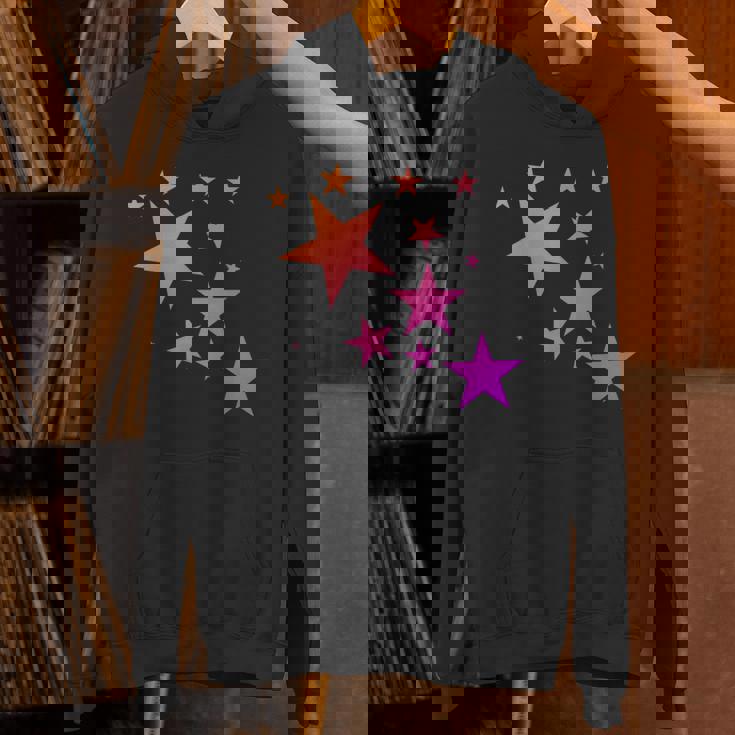 カラフルなオレンジピンクの星、流れ星柄デザイン。 Hoodie