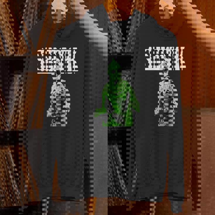 レトロなスリースタック爬虫類エイリアンのグラフィック。 パーカー