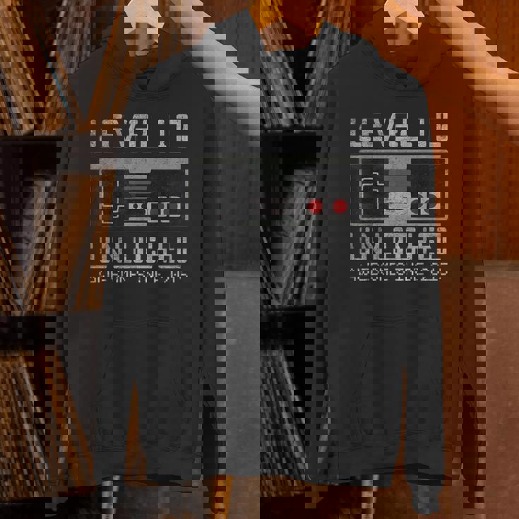 レベル 10 アンロック 10歳の誕生日 10歳のビデオゲーマー 男の子 パーカー