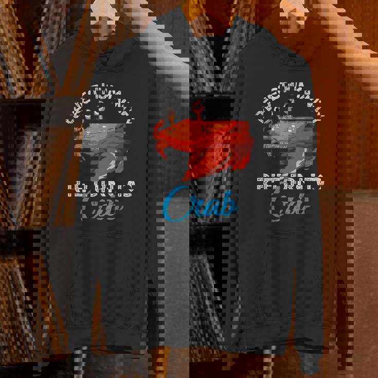 人類を拒絶するカニに戻る進化カニを抱きしめろ パーカー